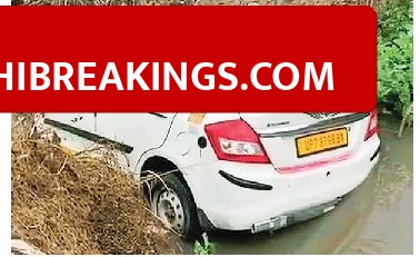 delhibreakings greater noida ola cab drain accident fog update Greater Noida Fog Havoc: Ola Cab Falls Into Drain at Bhati Roundabout, Authority Finally Starts Wall Construction